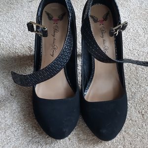 Black platform pumps with ankle strap